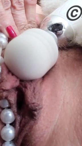 Iconic moment from &quot;sexy masturbation amateur munichgold with big natural tits and big hairy pussy with long labia comes&quot;
