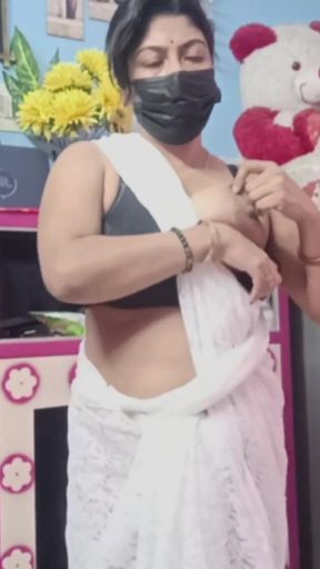 Key moment from &quot;Horny Indian Aunty with Big Tits Changes Saree and Plays with Hairy Pussy, Mature Mom Fantasy.&quot;