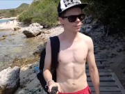 Russian teen walks on the beach and shows his cock in public, but he was seen