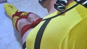 Miss M keeps a footballer in yellow and black kit and watches him struggling to get out of tight bondage