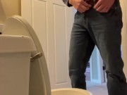 Candid shot of guy Pissing.