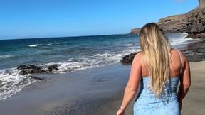 Beach pee in blue dress