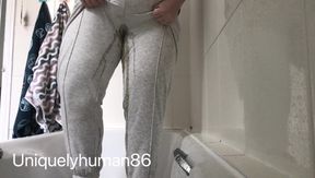 Exciting First Wetting in Grey Joggers After a Long Break!