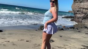 Girl Peeing and Wetting Skirt Pants at the Public Beach