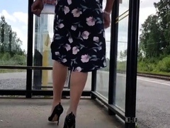 HannaTransa Chastity Crossdresser outdoors at train station.