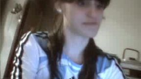Webcam scene with brunette teen exposing her booty