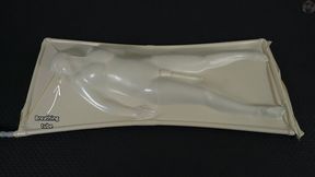 A girl has an orgasm from a vibrator while lying inside a white vacuum bed with a breathing tube (FULL HD MP4)