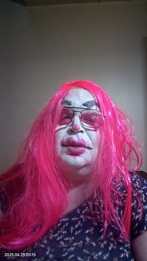 TV clown slut smoking a cigarillo and talking dirty