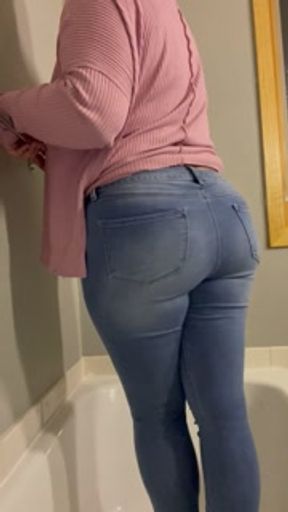 Desperately trying to hold my pee but wet my jeans!