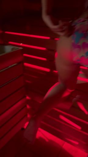 Bikini-clad babe flashes her public pussy in a sauna, wearing a buttplug