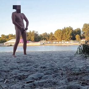 Dude pissing, jerking and cumming at nude beach. Got caught