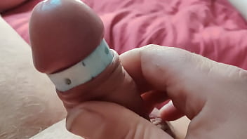 ifoslave playing with a cock ring and cum