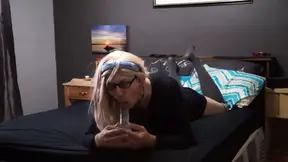 Sucking on a dildo