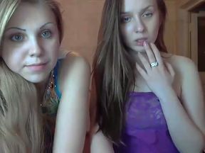 Two Russian teen lesbians are back at again and they love showing off