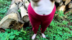 Barefoot and topless in the forest