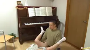 Piano teacher rear fucks his pupil across the piano keys