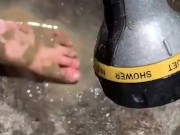 Cleaning my muddy feet with hose