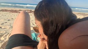 MILF public blowjob on a beach