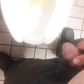 Peeing and then stroking it a little before going back to work