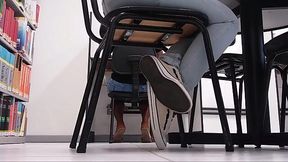 Stockinged feet tease in the library!