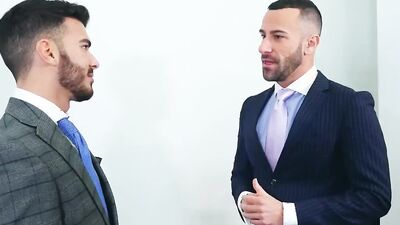 Gustavo Cruz and his colleague are barebacking in the office