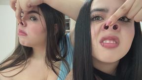 My stepsister and I playing with our noses in front of the camera