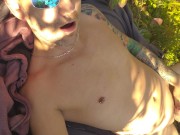 Fun by the water in public park with buttplug