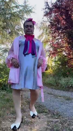 Dressed in a nightgown and robe for a morning