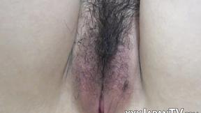 ”Japanese teenie presents her sweet little twat in close up”