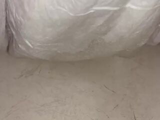 Chick fills up diaper with urinate until it overflows out the side