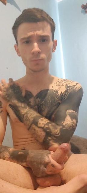 Tatted skinny guy jerking off and cumming