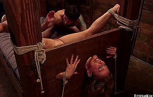 Blonde in wooden stock rough banged