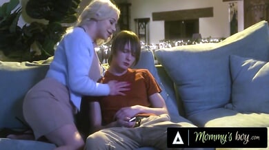 Blonde MILF stepmom rides young muscular stepson in forbidden living room encounter