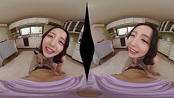 Young Japanese girl rides dick POV