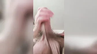 Uncut bear with big cock strokes and shoots thick cum
