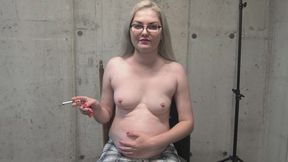 Topless pregnant smoking