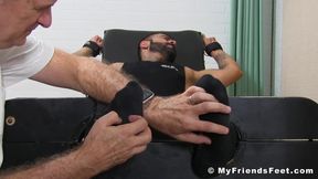 Handsome bearded hunk bound for kinky body and feet tickling