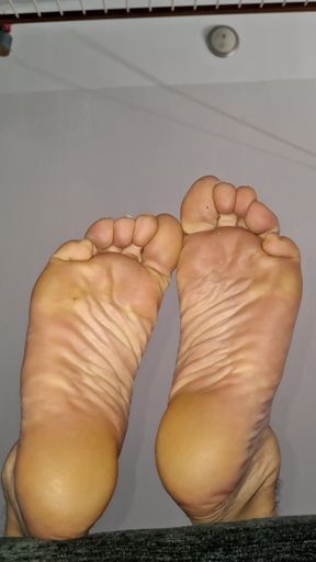 Showing my big soles from the floor up