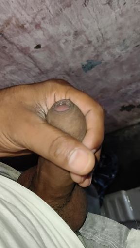 A 22-year-old boy with a fist clenched