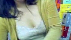 Very cute Japanese brunette milf on the webcam shaking ass
