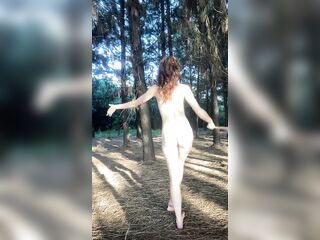Watch my slim booty while I dance in nature's garb in the woods