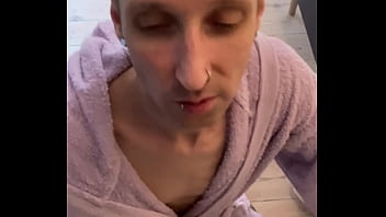 Gay guy in bathrobe sucks a cock