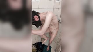Youngster showering with gas mask