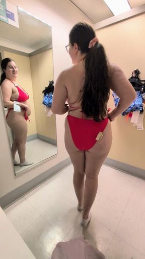 Trying on bikinis in the dressing room