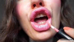 Sensual creamy pink lipgloss kiss