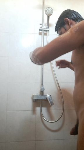 Exotic Skinned Asian Adult Man Taking a Shower in the Morning