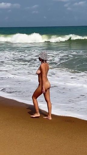 A Busty Blonde Is Walking and Sunbathing Naked