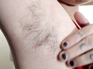 Lengthy darksome shaggy armpits closeup