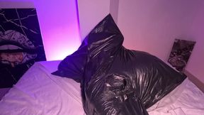 Girl in Garbage Bag Plays with Her Breath