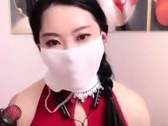 Chinese sexy girl use ballgag under tight mask